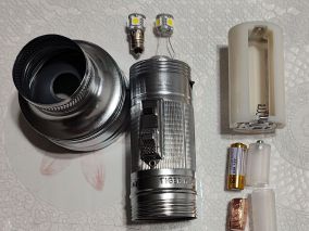 改造老式虎头牌手电筒使用23A12V电池