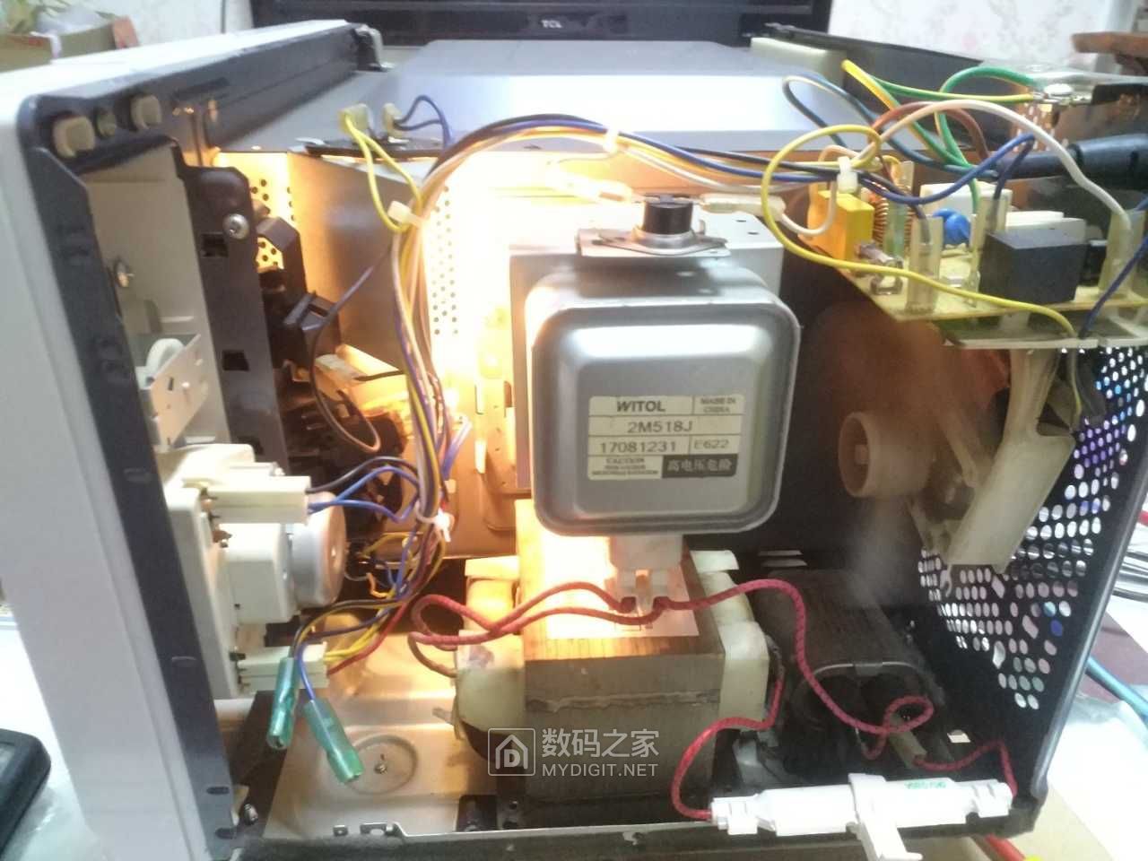 美的微波炉机械式m1211a开机烧220vt8a的保险