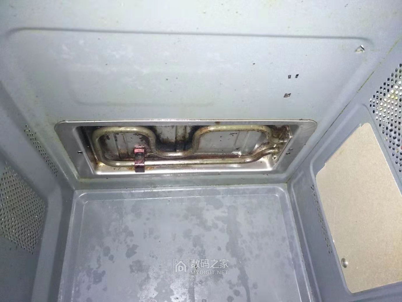 求助lg微波炉更换云母片后还是冒火花