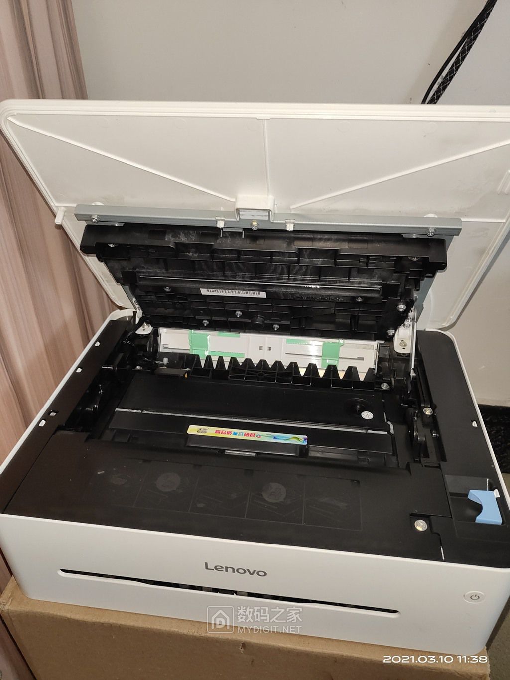 收了一部联想lj2208w打印机,左边有竖纹是何原因.