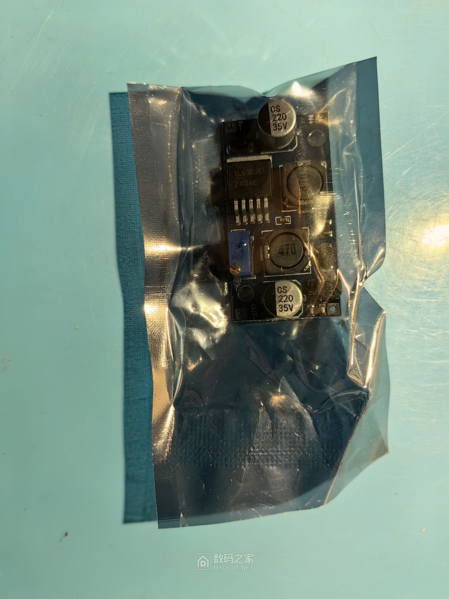 XL6009自动升降压模块，输入5-32V，输出可调，可在2.7A以下使用，实测家用光猫路由器供电电流在0.3-0.6A之  ...